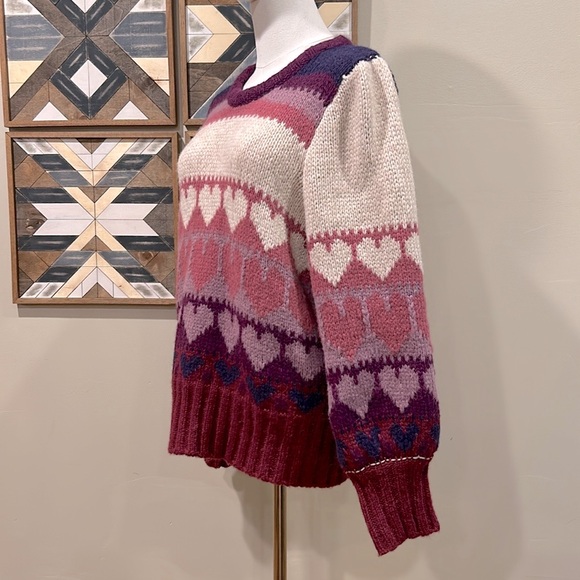 LoveShackFancy sweater
look at all pictures, especially the shoulders - Picture 4 of 8